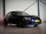BMW 3-Serie 330e M-Sport, Schuifdak, Trekhaak, winter en zomerset, Leer, Cruise