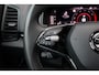 Skoda Karoq 1.5 TSI ACT Sportline Business Automaat | Virtual Cockpit | Trekhaak | Panoramadak | Adaptieve Cruise | Stoelverwarming | Camera | Canton