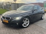 BMW 3-Serie 320i High Executive nap nette automaat vol leder schuifd elektr