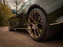Aston Martin Vanquish | Minotaur Green | Bronze dreamlines | Carbon interior | Stoelventilatie