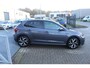 Volkswagen Polo 1.0 TSI R-Line Automaat/Navigatie/Virtual cockpit/Adaptive cruise control/Spraakbediening/Achteruitrijcamera/Parkeersensoren rondom/Apple carplay/Stoelverwarming/LED grill/IQ.light/Climate control/Draadloze telefoonlader/DAB/17''Lichtmetalen velgen.