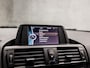 BMW 1-Serie 118i Business Sport 170Pk (APPLE CARPLAY, CLIMATE, STOELVERWARMING, ZWART HEMEL, GETINT GLAS, SPORTSTOELEN, CRUISE, XENON, PARKEERSENSOREN, NIEUWE APK, ARMSTEUN, NIEUWSTAAT)