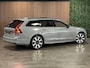 Volvo V90 T8 AWD Recharge Ultra Ultimate Dark | Schuifdak | Trekhaak | 455pk | Head-Up Display | Harman Kardon | Adaptieve Cruise Control | Stoel en Stuurwielverwarming | Parkeercamera | Full LED Meesturende koplampen | Pilot Assist | BLIS Dode Hoek Detectie | Google Infotainment | 19 Inch | Elektrische voorstoelen geheugen | Lederen bekleding | Zitting verlenging voorstoelen | Lederen Dashboard | Keyless Drive | Geïntegreerde kinderzitjes achterin | Geïntegreerde zongordijnen achterportieren | Parkeersensoren voor+achter | Privacy Glass | Elektrisch bedienbare achterklep | DAB Radio | Apple Carplay/Android Auto | Volvo On Call met mobiele App functie | Vapour Grey Metallic |
