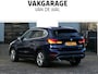 BMW X1 sDrive18i High Executive | Orange edition | Trekhaak | Achteruitrijcamera | Sport stoelen | LED | Elektrische achterklep | Stoelverwarming | Climate Control