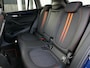 BMW X1 sDrive18i High Executive | Orange edition | Trekhaak | Achteruitrijcamera | Sport stoelen | LED | Elektrische achterklep | Stoelverwarming | Climate Control
