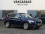 BMW X1 sDrive18i High Executive | Orange edition | Trekhaak | Achteruitrijcamera | Sport stoelen | LED | Elektrische achterklep | Stoelverwarming | Climate Control