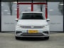 Volkswagen Touran 1.4 TSI Highline Business R 7p | Trekhaak | Stoelverwarming | Matrix LED Koplampen | Adaptieve Cruise Control | Parkeersensoren | 18'' Lichtmetalen Velgen | Privacy Glas | Climate Control | Elektrische Klep | 7 Persoons |