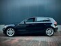 BMW 1-Serie 116i EDE Executive Sport * Cruise * Navi * Trekhaak *
