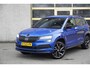 Skoda Karoq 1.5 TSI ACT 150PK! Automaat Sportline Business BJ2020 Lmv 19" | Led V+A | Pdc | Navi | Keyless entry | Afneembare trekhaak | Verwarmd voorruit | Elek. achterklep | Achteruitrijcamera | App-Connect | Virtual cockpit | Verwarmde voorstoelen | Zwarte hemel