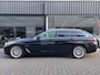 BMW 5-Serie Touring 520e Leer Navi Electrisch verstelbare stoel Achteruitrij camera Stoelverwarming Electrische achterklep