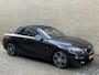 BMW 2-Serie Cabrio 218i High Executive M-pakket | Leder | Camera | Navigatie | Apple CarPlay / Android Auto | 18 inch LMV | Sportstoelen | Sportstuur | LED | DAB | Windscherm | Stoelverwarming | Volledig onderhouden | Origineel NL-auto met NAP!