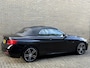 BMW 2-Serie Cabrio 218i High Executive M-pakket | Leder | Camera | Navigatie | Apple CarPlay / Android Auto | 18 inch LMV | Sportstoelen | Sportstuur | LED | DAB | Windscherm | Stoelverwarming | Volledig onderhouden | Origineel NL-auto met NAP!