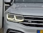 Volkswagen Tiguan 1.5 TSI R-Line | Navigatie/Android/Apple Carplay | LM Velgen 19" | Elektrisch Glazen Panoramadak | Voorstoelen Verwarmd | Cruise Control Adaptief | Achteruitrijcamera | Airco |