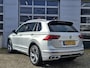 Volkswagen Tiguan 1.5 TSI R-Line | Navigatie/Android/Apple Carplay | LM Velgen 19" | Elektrisch Glazen Panoramadak | Voorstoelen Verwarmd | Cruise Control Adaptief | Achteruitrijcamera | Airco |