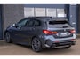 BMW 1-Serie M135i xDrive | Pano | Shadow-Line | LED Projector | Live Cockpit | HUD | Carplay | Sfeer | Active Guard Plus | Camera | Draadloos Laden | 19 Inch M-Sport | Keyless | 1 Eigenaar | Dealer Onderhouden | BTW | Garantie