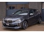 BMW 1-Serie M135i xDrive | Pano | Shadow-Line | LED Projector | Live Cockpit | HUD | Carplay | Sfeer | Active Guard Plus | Camera | Draadloos Laden | 19 Inch M-Sport | Keyless | 1 Eigenaar | Dealer Onderhouden | BTW | Garantie