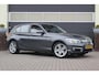 BMW 1-Serie 118i Centennial High Executive | Leer | Camera |