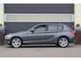 BMW 1-Serie 118i Centennial High Executive | Leer | Camera |