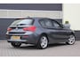 BMW 1-Serie 118i Centennial High Executive | Leer | Camera |