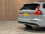 Volvo V60 T8 AWD Recharge Ultra Dark | Trekhaak | Schuifdak | 455pk | Head-Up Display | Harman Kardon | Adaptieve Cruise Control | Stoelverwarming voor+achter | Stuurwielverwarming | Full LED Meesturende koplampen | Parkeercamera | Pilot Assist | BLIS Dode Hoek Detectie | Elektrische voorstoelen geheugen | Lederen bekleding | Zitting verlenging voorstoelen | Lederen dashboard | 19 Inch | Google Infotainment | Keyless Drive | Parkeersensoren voor+achter | Privacy Glass | Elektrisch bedienbare achterklep | DAB Radio | Apple Carplay/Android Auto | Volvo On Call met mobiele App functie | Vapour Grey Metallic |