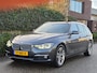 BMW 3-Serie Touring Nbt EVO Apple CarPlay LM Velgen Trekhaak NAP NL Gave Kleur 320i Luxury Edition