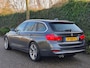 BMW 3-Serie Touring Nbt EVO Apple CarPlay LM Velgen Trekhaak NAP NL Gave Kleur 320i Luxury Edition