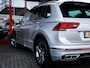 Volkswagen Tiguan 1.5 TSI R-Line Business+ | IQ Light | Navigatie | Camera | Matrix LED | Adaptieve Cruise Control | Navigatie | Virtual Cockpit | Apple Carplay | Android Auto | Metallic Lak | 3x R-Line | 19'' Lichtmetalen Velgen |