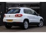 Volkswagen Tiguan 2.0 | Pano | Clima | Camera | Stoelverwarming | Xenon | Trekhaak | LM Velgen | Navi