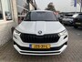 Skoda Karoq 1.5 TSI ACT Sportline Business / TREKHAAK/ STUUR+STOELVERWARM.V+A/ PARK.SENSOR.V+A/ CAMERA/ DCC/ SMARTLINK/ ACC/ KEYLESS/ NAVI/ RIJ-MODI/ CLIMA/ DAB/ LED/ DIGITAL DASH/ ISOFIX/ 18'' LMV
