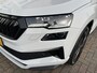Skoda Karoq 1.5 TSI ACT Sportline Business / TREKHAAK/ STUUR+STOELVERWARM.V+A/ PARK.SENSOR.V+A/ CAMERA/ DCC/ SMARTLINK/ ACC/ KEYLESS/ NAVI/ RIJ-MODI/ CLIMA/ DAB/ LED/ DIGITAL DASH/ ISOFIX/ 18'' LMV