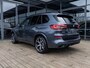 BMW X5 xDrive45e High Executive | M-SPORT | SKY LOUNGE PANORAMA/SCHUIF-KANTELDAK | BOWERS & WILKINS | STOELMASSAGE | STOELVENTILATIE | M-SPORT MULTIFUNCTIONELE STOELEN | BMW LASER LIGHT | INTEGRAL ACTIVE STEERING | 21 INCH | NL AUTO | ARCTIC GRAU | BTW |