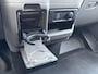 Volkswagen e-Transporter Caravelle 32 L1H1 Life 64 kWh Automaat 8 PERSOONS / garantie tot 12-2027 / WLTP 305 km / Stone Gray / Warmtepomp / Apple Carplay/Android Auto / Licht en zicht-pakket / Keyless entry / draadloze telefoonlader /