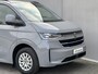 Volkswagen e-Transporter Caravelle 32 L1H1 Life 64 kWh Automaat / NIEUW/ Fabrieksgarantie tot 12-2027 / 8 Persoons / Stone Gray / Warmtepomp / Apple Carplay/Android Auto / Licht en zicht-pakket / Keyless entry / draadloze telefoonlader /