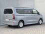 Volkswagen e-Transporter Caravelle 32 L1H1 Life 64 kWh Automaat / NIEUW/ Fabrieksgarantie tot 12-2027 / 8 Persoons / Stone Gray / Warmtepomp / Apple Carplay/Android Auto / Licht en zicht-pakket / Keyless entry / draadloze telefoonlader /