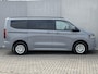 Volkswagen e-Transporter Caravelle 32 L1H1 Life 64 kWh Automaat / NIEUW/ Fabrieksgarantie tot 12-2027 / 8 Persoons / Stone Gray / Warmtepomp / Apple Carplay/Android Auto / Licht en zicht-pakket / Keyless entry / draadloze telefoonlader /