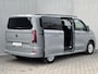 Volkswagen e-Transporter Caravelle 32 L1H1 Life 64 kWh Automaat / NIEUW/ Fabrieksgarantie tot 12-2027 / 8 Persoons / Stone Gray / Warmtepomp / Apple Carplay/Android Auto / Licht en zicht-pakket / Keyless entry / draadloze telefoonlader /