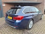 BMW 3-Serie Touring 318i Luxury Edition Apple Carplay / Harman & Kardon / Stoelverwarming / Led Verlichting / DAB Radio