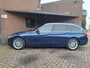 BMW 3-Serie Touring 318i Luxury Edition Apple Carplay / Harman & Kardon / Stoelverwarming / Led Verlichting / DAB Radio