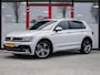 Volkswagen Tiguan 1.5 TSI R-Line | Trekhaak | LED Koplampen | Adaptieve Cruise Control | Parkeersensoren | Climate Control | Apple Carplay | Android Auto | Privacy Glas | Keyless Entry & GO | Flippers | Variabele Stuuroverbrenging | 19'' Lichtmetalen Velgen |