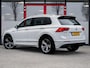 Volkswagen Tiguan 1.5 TSI R-Line | LED Koplampen | Adaptieve Cruise Control | Parkeersensoren | Climate Control | Apple Carplay | Android Auto | Privacy Glas | Keyless Entry & GO | Flippers | Variabele Stuuroverbrenging | 19'' Lichtmetalen Velgen |