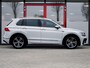 Volkswagen Tiguan 1.5 TSI R-Line | Trekhaak | LED Koplampen | Adaptieve Cruise Control | Parkeersensoren | Climate Control | Apple Carplay | Android Auto | Privacy Glas | Keyless Entry & GO | Flippers | Variabele Stuuroverbrenging | 19'' Lichtmetalen Velgen |