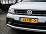 Volkswagen Tiguan 1.5 TSI R-Line | Trekhaak | LED Koplampen | Adaptieve Cruise Control | Parkeersensoren | Climate Control | Apple Carplay | Android Auto | Privacy Glas | Keyless Entry & GO | Flippers | Variabele Stuuroverbrenging | 19'' Lichtmetalen Velgen |