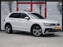 Volkswagen Tiguan 1.5 TSI R-Line | LED Koplampen | Adaptieve Cruise Control | Parkeersensoren | Climate Control | Apple Carplay | Android Auto | Privacy Glas | Keyless Entry & GO | Flippers | Variabele Stuuroverbrenging | 19'' Lichtmetalen Velgen |