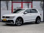 Volkswagen Tiguan 1.5 TSI R-Line | LED Koplampen | Adaptieve Cruise Control | Parkeersensoren | Climate Control | Apple Carplay | Android Auto | Privacy Glas | Keyless Entry & GO | Flippers | Variabele Stuuroverbrenging | 19'' Lichtmetalen Velgen |