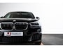 BMW X1 sDrive20i High Executive M Sport - Panoramadak - Comfort Access - Elektrisch verwarmde voorstoelen - HiFi - Verstelbare achterbank - Elektrische achterklep - LED koplampen - Koplampsproeiers -