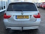 BMW 3-Serie Touring 318i Business Line | Trekhaak | Parkeer Sensoren | Sportstoelen | Navi | Cruise