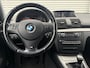 BMW 1-Serie 116i Business Line Ultimate Edition Navi|Leder|Trekhaak|Clima|Cruise|LM Velgen|N.A.P|APK tot 08-2026