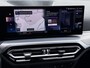 BMW 3-Serie Touring 320e | Trekhaak | Nieuw model | Carplay | Camera | Skyscraper grau | Sfeerverlichting | Widescreen | M Shadow
