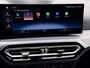 BMW 3-Serie Touring 320e | Trekhaak | Nieuw model | Carplay | Camera | Skyscraper grau | Sfeerverlichting | Widescreen | M Shadow