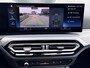 BMW 3-Serie Touring 320e | Trekhaak | Nieuw model | Carplay | Camera | Skyscraper grau | Sfeerverlichting | Widescreen | M Shadow